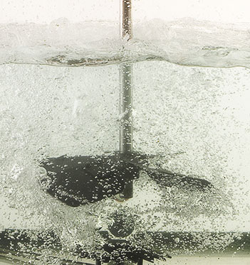 Impeller churning water